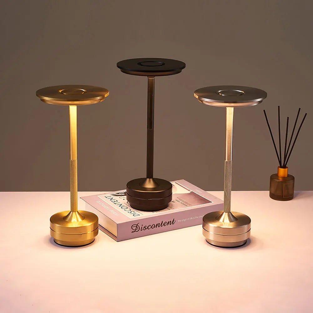 Mora Curve Aluminum Desk Lamp – Rechargeable styled in a bedroom interior