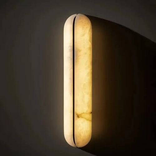Aera Frame Alabaster Wall Sconce – Luxury styled in a living room interior