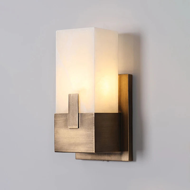 Livia Muse Natural Marble Wall Sconce – Dimmable styled in a living room interior