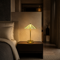 Ilyra Column gold cordless table lamp in a luxury boutique hotel bedroom