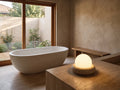 Mira Contour Travertine Desk Lamp – Rechargeable styled in a living room interior