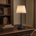 Ophelia Column black table lamp in an elegant study